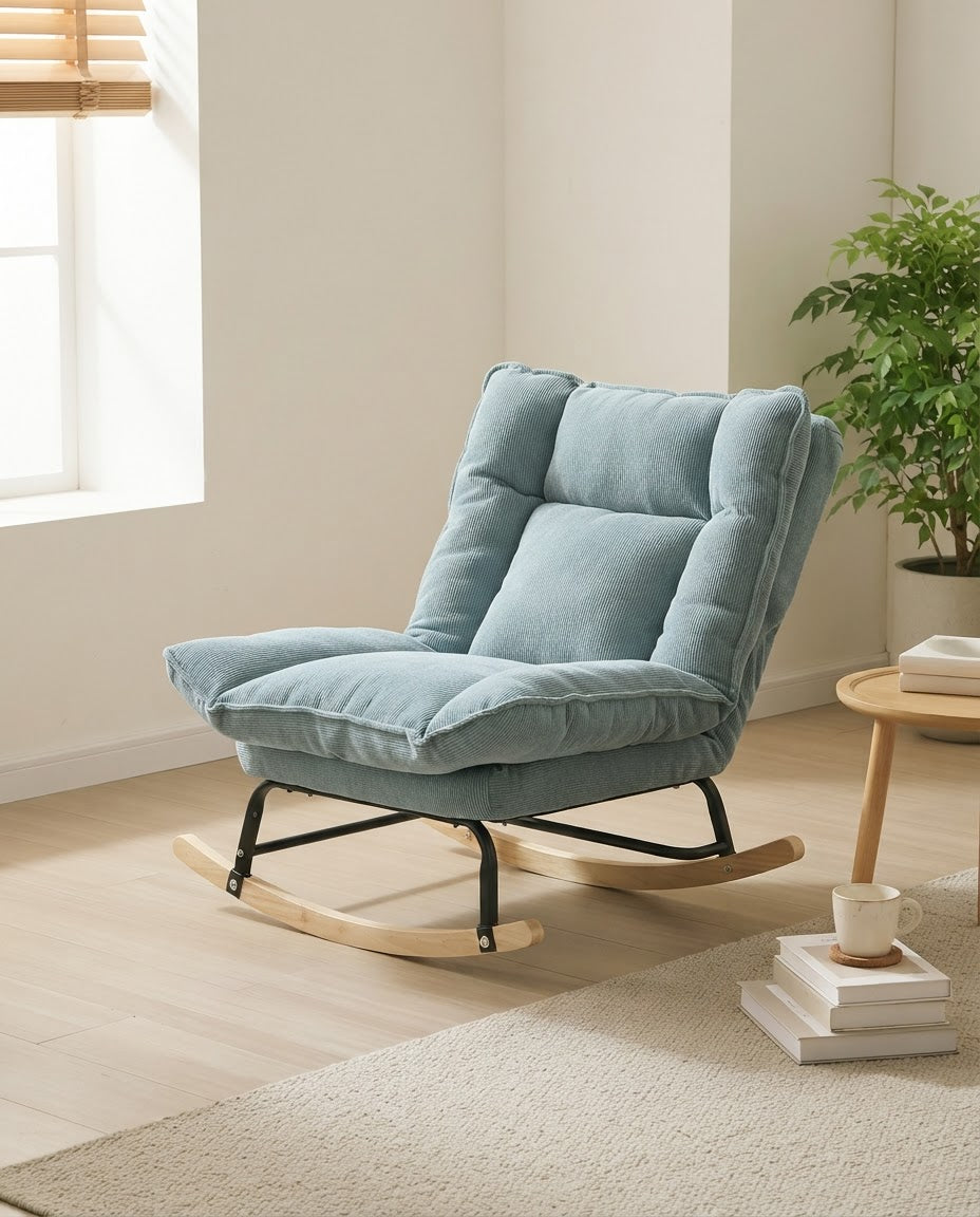 SIESTE – fauteuil à bascule coloris bleu clair en situation
